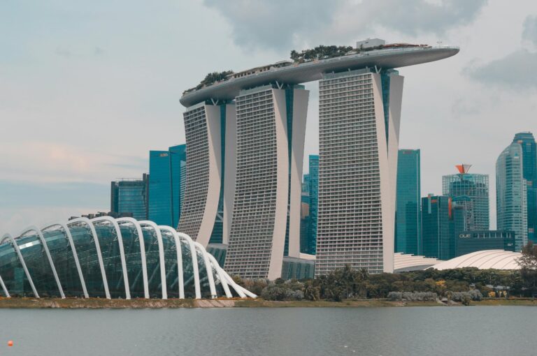 Futuristic architecture of the Marina Bay Sands resort and Gardens by the Bay in Singapore.