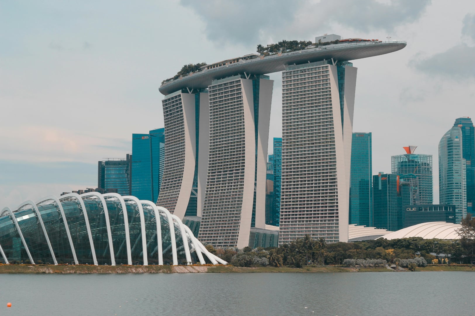 Futuristic architecture of the Marina Bay Sands resort and Gardens by the Bay in Singapore.